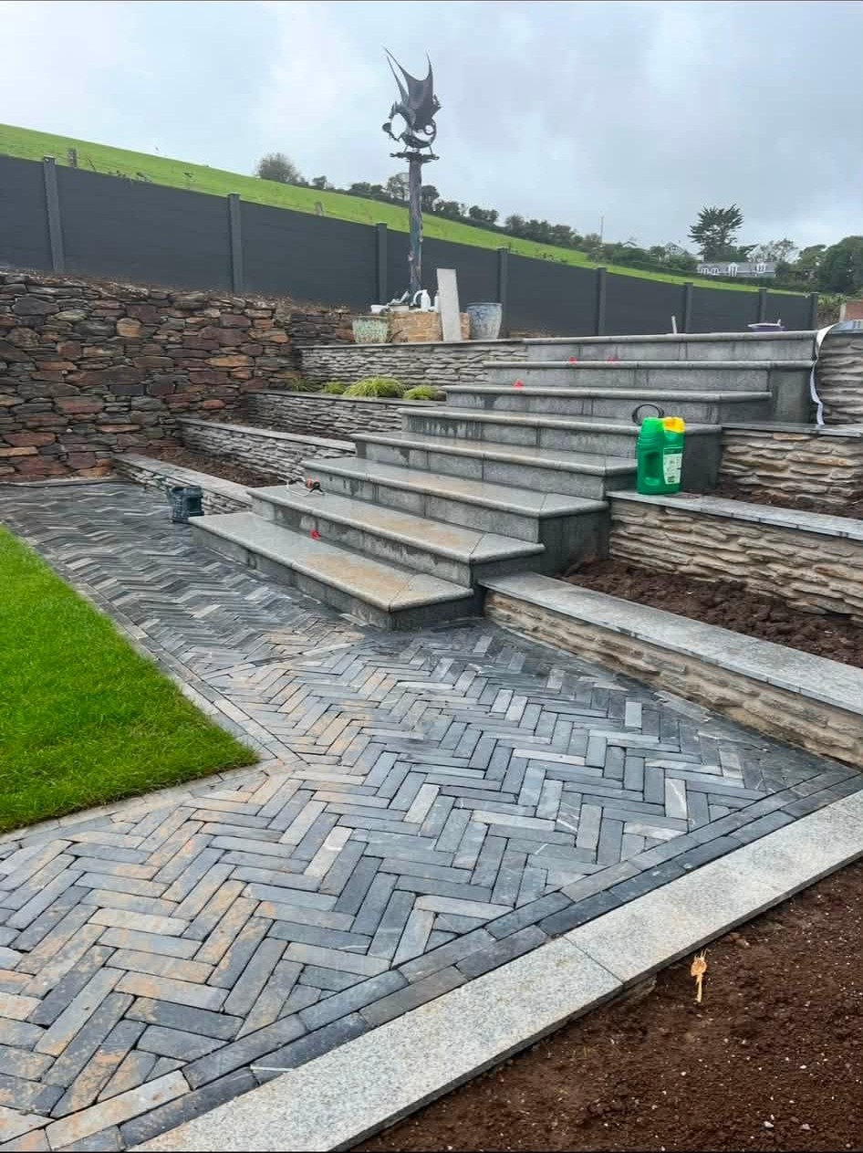 Herringbone paving and landscaped garden steps