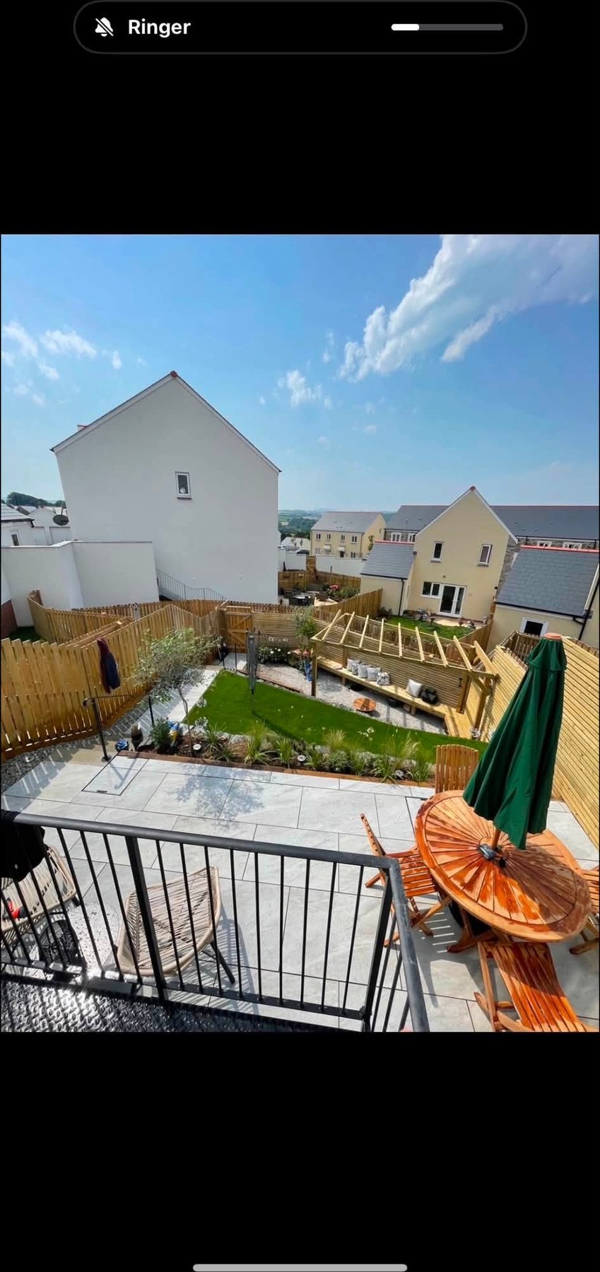 Completed landscaped garden with pergola and planting